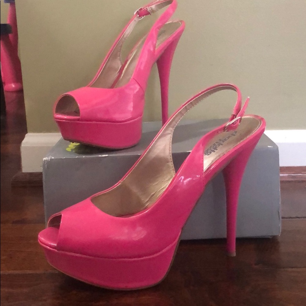Hot pink peep toe platform heels